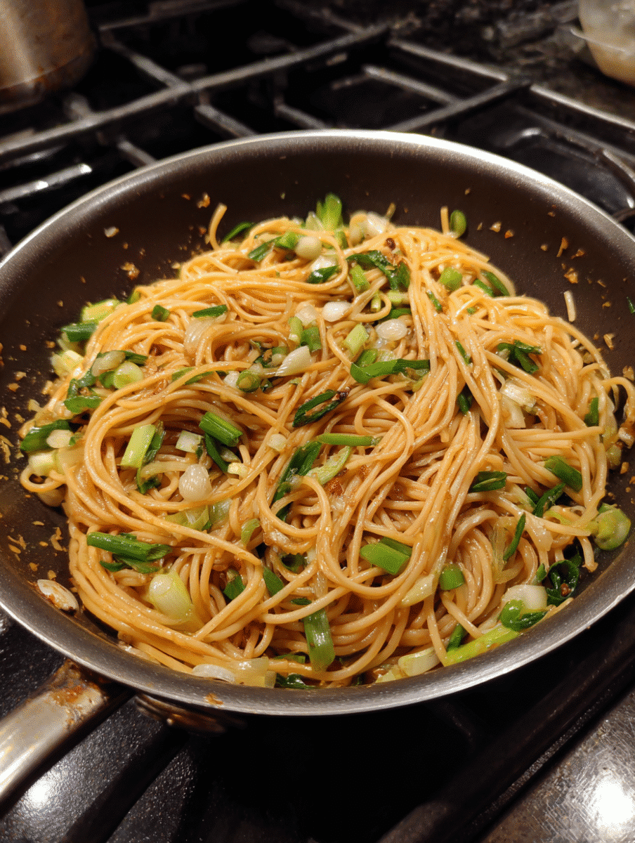 Overhead shot of the dish served in a bowl with fresh garnish, styled as a vibrant and inviting meal.